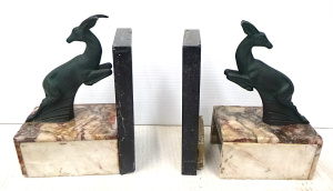 Lot 155 - Pr Art Deco Bookends - Patinated spelter on marble bases (af) approx 1