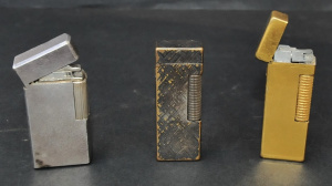 Lot 191 - 3 x vintage Dunhill Gas Cigarette Lighters - 2 made in Switzerland, th Lot 191 - 3 x vintage Dunhill Gas Cigarette Lighters - 2 made in Switzerland, th