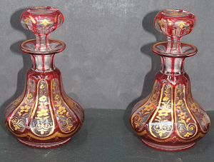 Lot 243 - Pair Ruby Flash Cut Crystal Perfume bottles w handpainted gilt floral