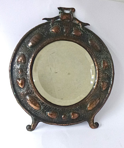 Arts and Crafts Copper Wall Mirror, embossed heart decoration with bevelled roun