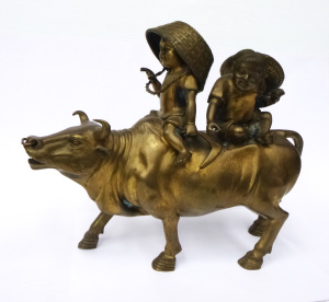 Lot 200 - Vintage Oriental Heavy Brass Figure of two farming children riding a b Lot 200 - Vintage Oriental Heavy Brass Figure of two farming children riding a b