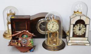 Lot 56 - Shelf Lot of 6 Clocks, Including 3 Dome Clocks, A Swiss Cabin Style Clo Lot 56 - Shelf Lot of 6 Clocks, Including 3 Dome Clocks, A Swiss Cabin Style Clo