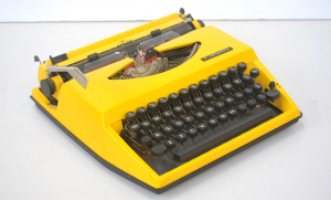 Lot 91 - Vintage Adler Tippol Portable Typewriter in Retro Yellow - Made in Holl