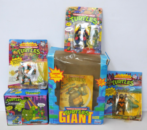 Lot 128 - Lot of Vintage Teenage Mutant Ninja Turtles incl Carded Figures, Story Lot 128 - Lot of Vintage Teenage Mutant Ninja Turtles incl Carded Figures, Story