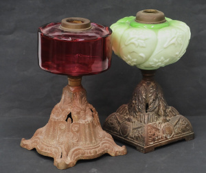 Lot 130 - 2 x Victorian oil lap case iron bases & glass fonts, one ruby glas