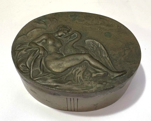 Lot 169 - Heavy brass oval box with embossed Leda & the Swan scene to lid -