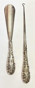 Lot 173 - Pair large Sterling Silver button hook & shoe horn - London 1897 -