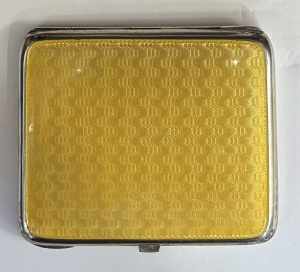 Lot 180 - 1920s David Andersen Norway yellow guilloche enamel silver cigarette