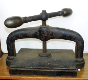 Lot 73 - Antique cast iron book press with brass handles 50cm W - heavy