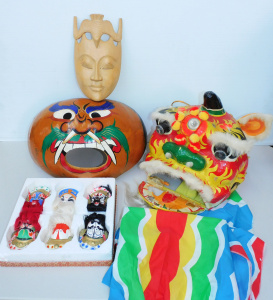 Lot 79 - Group lot of Masks inc Chinese Lion dance mask, Hand painted Gourd, Box