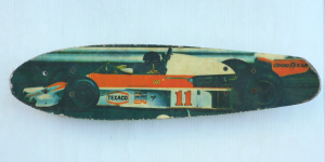 Lot 103 - Vintage c1970s Fibreglass Skateboard featuring Formula 1 Racing car to
