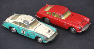 Lot 182 - 2 Vintage Corgi Toys Aston Martin DB4s in differing colour schemes