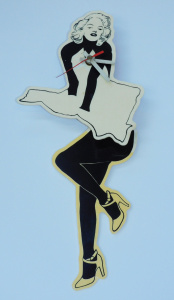 Lot 212 - Retro 1980s Plastic 2 piece Novelty Marylin Monroe Clock w Swinging le