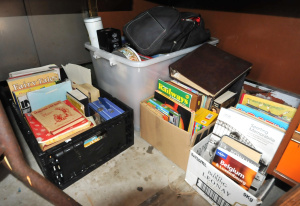 Lot 14 - Group Lot of Books, DVDs, Assorted Tins & Ephemera incl Cigarette T Lot 14 - Group Lot of Books, DVDs, Assorted Tins & Ephemera incl Cigarette T