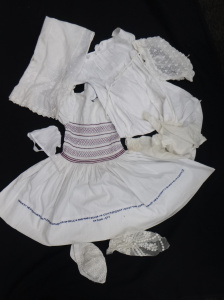Lot 60 - Box lot of Circa 1900 and later childrens clothing items inc, 1950s han