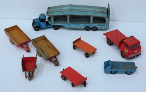 Lot 110 - Lot of Vintage Dinky Transport Vehicles, Trailers, and a Wheel Barrow Lot 110 - Lot of Vintage Dinky Transport Vehicles, Trailers, and a Wheel Barrow