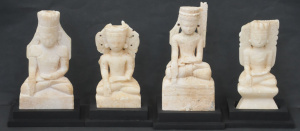 Lot 156 - Set of 4 Carved Stone Eastern Deities in fitted stepped wooden plinths Lot 156 - Set of 4 Carved Stone Eastern Deities in fitted stepped wooden plinths