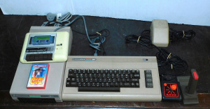 Lot 1 - Commodore 64 with Power Supply, 154I 525 Floppy Disk Drive, Datassette,