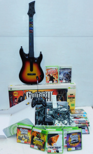 Lot 34 - Xbox360 Console in Original Box, 3x Controllers, Media Remote, 2 x Guit