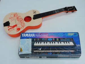 Lot 120 - Yamaha PSS-100 Digital Recording Keyboard and a Vintage Plastic Framed