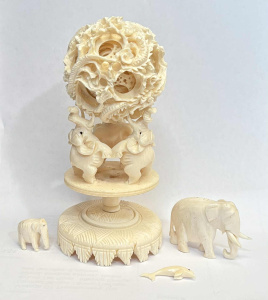 Lot 185 - Grp carved bone - Chinese 5 sphere puzzle ball supported on elephant s Lot 185 - Grp carved bone - Chinese 5 sphere puzzle ball supported on elephant s