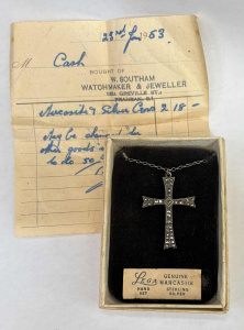 Lot 188 - Silver Marcasite cross pendant on chain in original with receipt