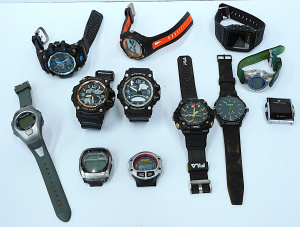 Lot 30 - Group lot of sports and other watches inc Rip Curl, Reebok, Fila, Mambo Lot 30 - Group lot of sports and other watches inc Rip Curl, Reebok, Fila, Mambo