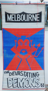 Lot 133 - Retro Melbourne Demons (VFL) Woven Nylon Mat 175cm L Lot 133 - Retro Melbourne Demons (VFL) Woven Nylon Mat 175cm L