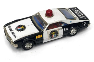 Lot 196 - Vintage pressed tin Bump-N-Go Oldsmobile Tornado Highway Patrol by Tai Lot 196 - Vintage pressed tin Bump-N-Go Oldsmobile Tornado Highway Patrol by Tai