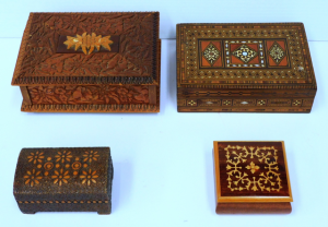 Group of 4 small carved and inlaid boxes Largest 17cm W Group of 4 small carved and inlaid boxes Largest 17cm W