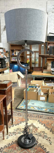Modernist chrome standard lamp featuring C shape