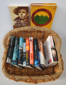 Lot 160 - Square Cane Basket of Books inc HC Maffra The history of the shire to