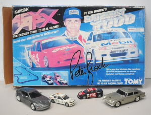 Lot 17 - Boxed Tomy AFX Arora Peter Brock's Bathurst 1000 set with 2 additional