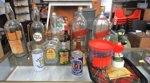 Lot 21 - Collection of vintage bar items inc large whisky bottles in cradles and