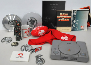 Lot 62 - Box lot of Holden items inc LH Torana manual, hubcaps, mug etc, Play St