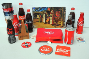 Lot 81 - Group of novelty Coke items inc set of anodised cups, pennant, salt and