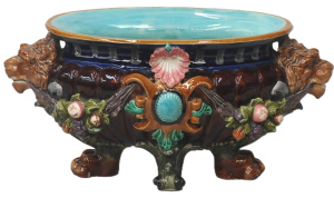 Lot 214 - c1900 Majolica fruit and lion Cachepot, impressed no to base 992, dama