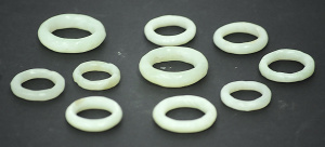 Lot 180 - Group of 10 nephrite jade rings in various sizes