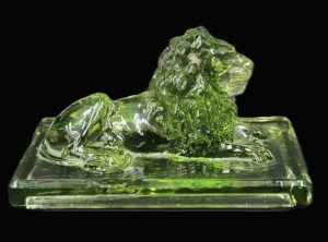 Lot 177 - Vintage c1900 Green Glass Reclining Lion Paperweight - on rectangular