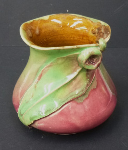 Lot 218 - Remued Australian drip glazed pottery gumnut vase incised Remued to ba