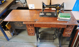 Lot 69 - Vintage Singer Treadle Sewing Machine with oak upper with decorated dra
