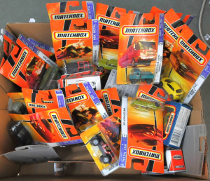 Lot 135 - Large lot of boxed and carded modern Matchbox cars