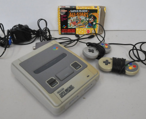 Lot 155 - Nintendo SNES Games Console w Boxed Super Mario All-Stars Game , 2 x C