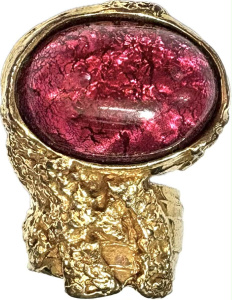 Lot 209 - Yves St Laurent Arty gilt ring with oval pink mottled stone (af)