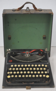 Lot 6 - 1920s Remington Portable typewriter, German keyed, with case - 30cm D