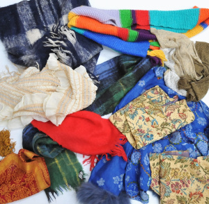 Lot 13 - Box lot Colourful items inc knitted scarves, mohair knee rug, shawls, f