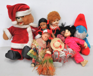 Lot 79 - Group of vintage dolls inc Christmas Teddy Ruxpin, Papa Smurf, mid-cent