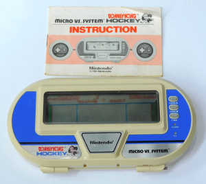 Lot 180 - Retro Nintendo Mirco Vs System Hand Held Computer Game with Retractabl