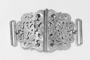Lot 180 - c1890 ornate EPNS Nurses buckle with unusual spring stretch mechanism