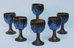 Lot 97 - Set of 6 Robert Beck lava glazed pottery goblets, incised signature to